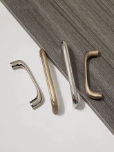 Load image into Gallery viewer, French Creative Silver Cabinet Pulls, Modern Minimalist High‑End Handles for Drawers, Kitchen, Shoe Cabinet and Wardrobe Doors
