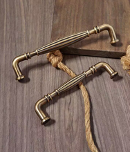 Load image into Gallery viewer, Mid‑Century Retro Brass Drawer Pulls, Minimal European French Pastoral Handles for Cabinet Shoe Cabinet Wardrobe

