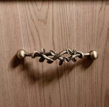 Load image into Gallery viewer, Vine‑Shaped Brass Drawer Pulls for Kids Room, Mid‑Century Antique Bronze French Retro Handles for Kitchen Cabinet Wardrobe
