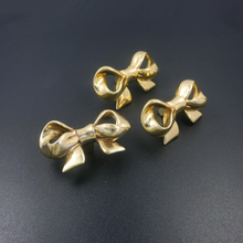Load image into Gallery viewer, Modern Gold Brass Bow Knobs &amp; Pulls | Dresser, Drawer, Girls Room Cabinet, Kitchen &amp; Gift Hardware

