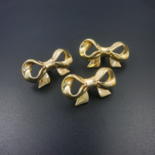 Load image into Gallery viewer, Modern Gold Brass Bow Knobs &amp; Pulls | Dresser, Drawer, Girls Room Cabinet, Kitchen &amp; Gift Hardware
