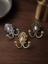 Load image into Gallery viewer, European Vintage Solid Brass Wall Hooks, Light Luxury Silver‑Gold Coat Hooks for Entryway, Cloakroom, Bathroom and Wardrobe
